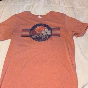 Orange Graphic Tee with Floral Design